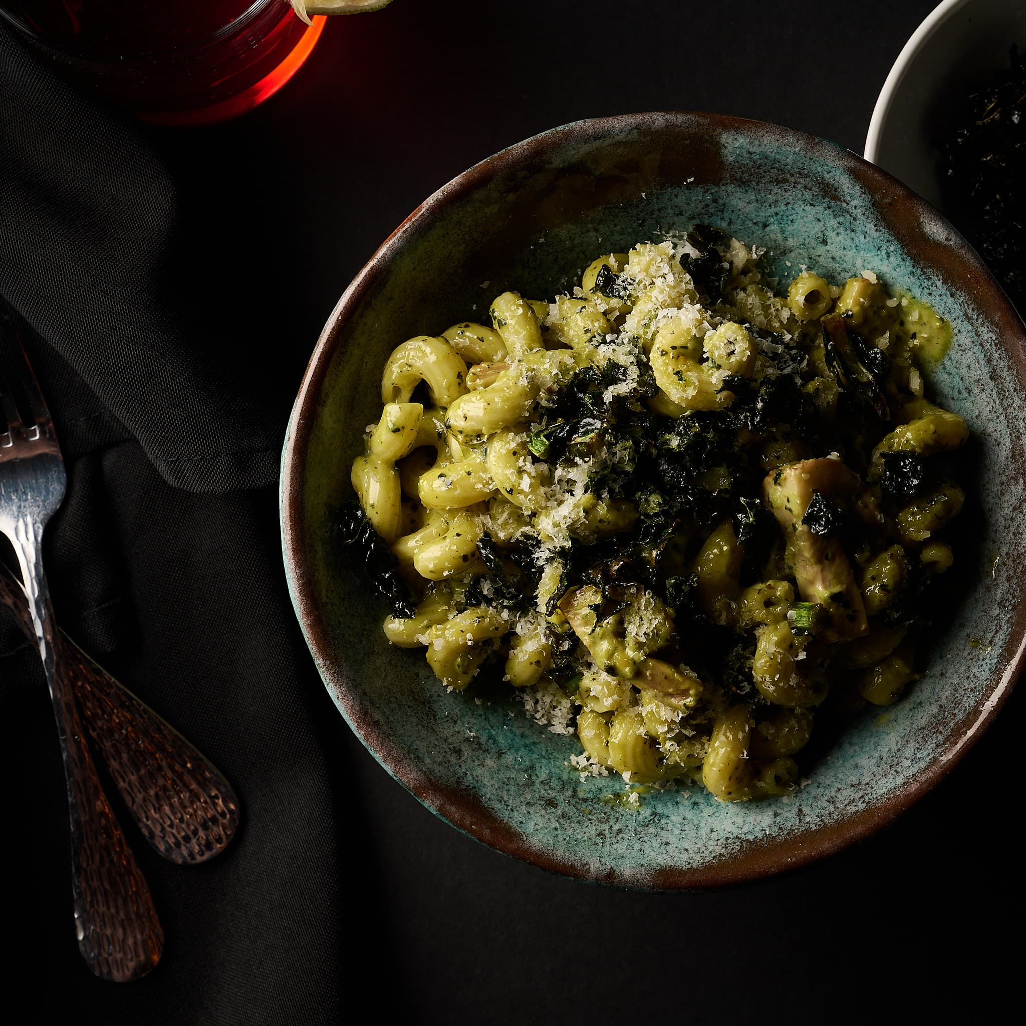 Pesto cavatappi in rustic ceramic bowl