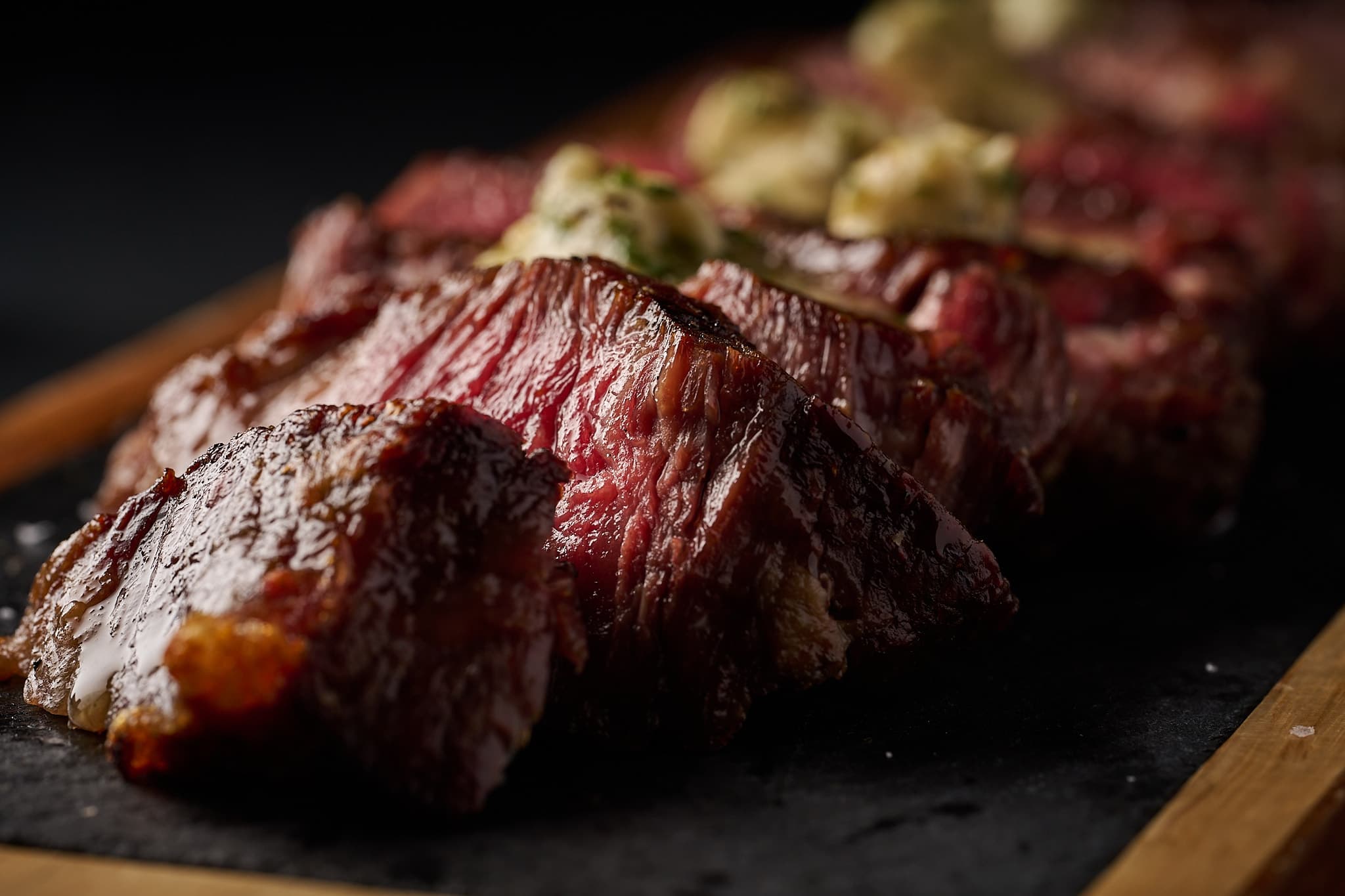 Sliced ribeye with herb butter